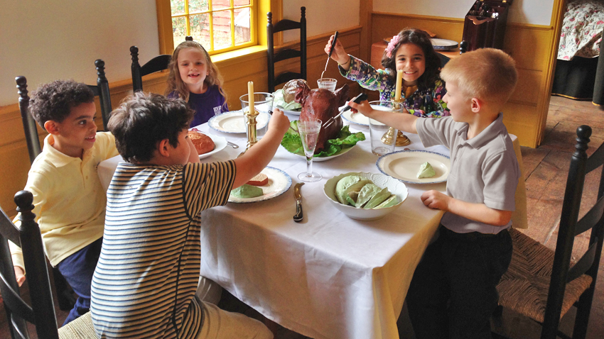 kids at the Strong-Howard House dining room table